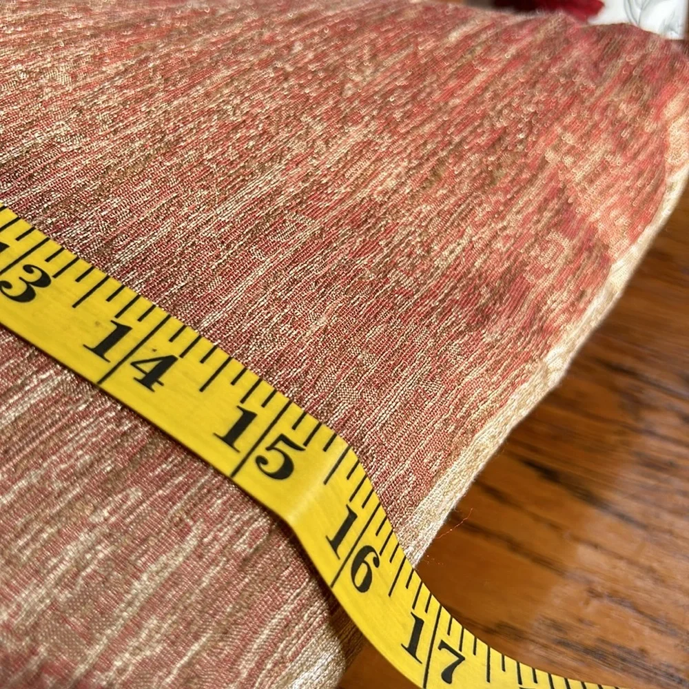 Unbranded braided cord accent pillow. Approximately 16” square.